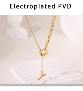 Detail of PVD plated gold necklace with asymmetric chain and OT toggle clasp closure