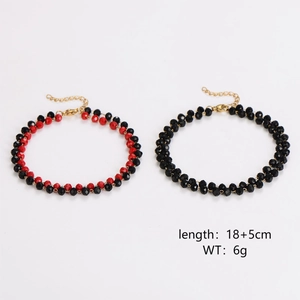 Minimalist beaded bracelet set with red and black crystals and golden adjustable chain