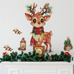 Detail of Christmas reindeer wall stickers with lanterns and stars on a white living room wall