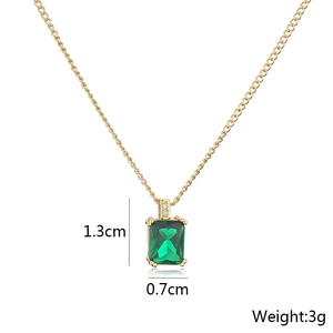 Detail of 18K gold-plated necklace featuring a green zircon pendant measuring 1.3cm by 0.7cm