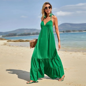 Sexy backless green maxi dress with deep V-neck and ruffled hem for beach summer vacations