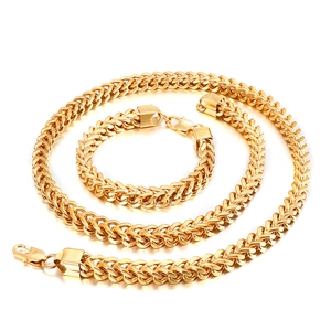 Parure de bijoux dorée avec collier et bracelet maille dragon et fermoirs mousquetons polis