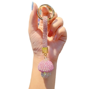 Pink rhinestone mushroom keychain with sparkling crystal strap and gold-tone metal ring