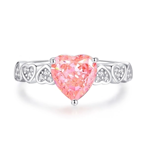 S925 sterling silver ring featuring a large heart-shaped pink gem and side pavé diamonds