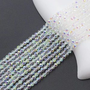 Macro shot of 4mm faceted glass crystal beads showing rainbow AB coating and sparkle