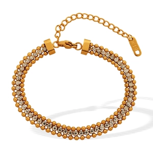 Three-strand 18K gold plated stainless steel bracelet with white zircon stones