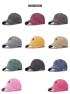 Collection of washed vintage baseball caps in 11 colors featuring strawberry embroidery