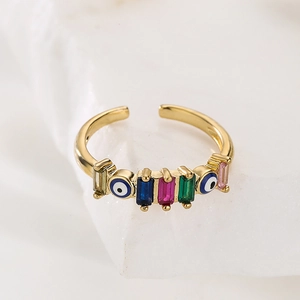 Detail of 18K gold-plated ring with colorful zircons and evil eye charms