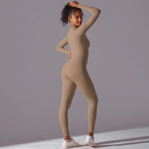 Rear side view of a khaki long-sleeve skin-tight yoga bodysuit showing body curves