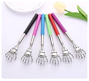Detail of six telescopic stainless steel back scratchers with colorful handle grips