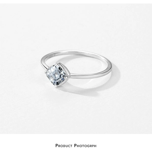 Macro shot of cushion-cut cubic zirconia ring in S925 sterling silver four-prong setting