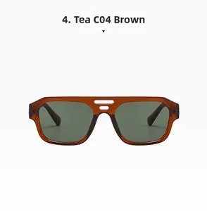Detail of brown double-bridge sunglasses with dark green lenses and stylish punk frame