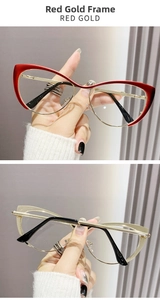 Detail of cat-eye metal glasses frame in red gold and black with vintage hinge design