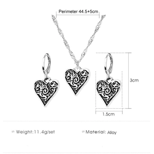 Detail showing vintage alloy heart necklace set with engraved patterns and size specs