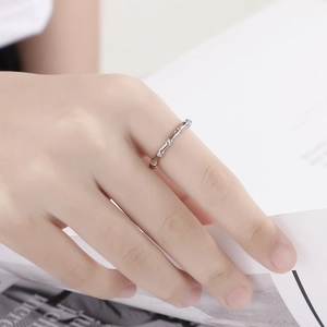 Minimalist silver bamboo joint open ring for women shown on hand with a modern style