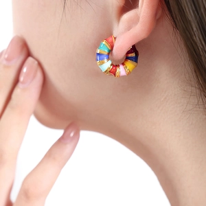 Rainbow enamel twisted hoop earrings in gold plated stainless steel for women