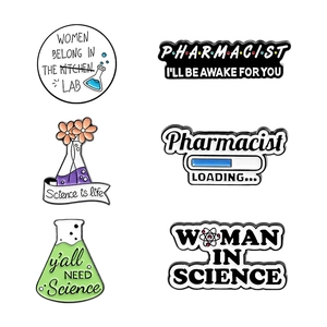 Set of six cartoon science enamel pins featuring laboratory themes and feminist slogans