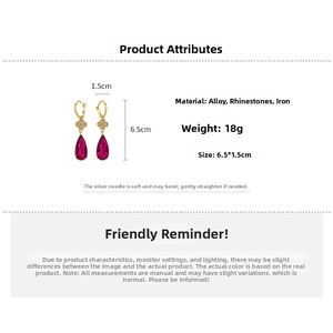 Detail view of drop earrings in gold and rose red with measurements and weight specifications