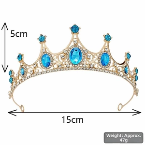 Detailed view of gold crown with blue gems, measuring 15cm wide and 5cm high