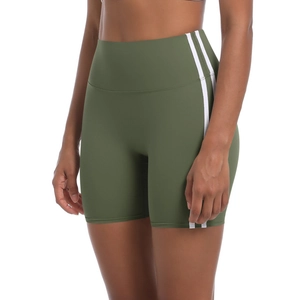 Close-up of army green high-waisted fitness shorts with white side stripes and breathable fabric