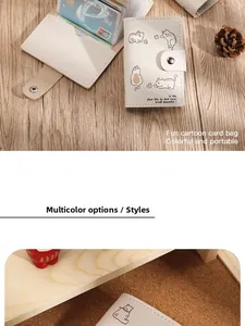 Detail view of cream card holder with cute cat illustration and multi-card transparent slots