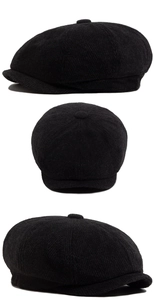 Detailed views of black herringbone newsboy cap showing wool texture and stitching