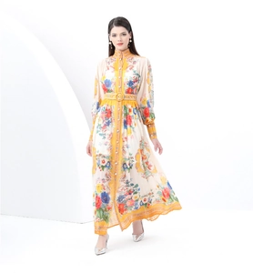 Detail of retro floral print maxi dress with stand collar and elegant lantern sleeves