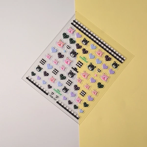 Detailed 5D embossed nail stickers featuring pink leopards, hearts and checkered patterns
