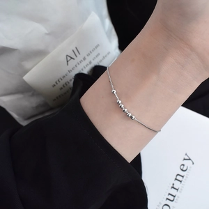 Minimalist 925 sterling silver bead bracelet for women featuring seven polished silver beads