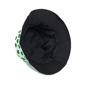 White bucket hat with green shamrock clover print for outdoor sun protection and style