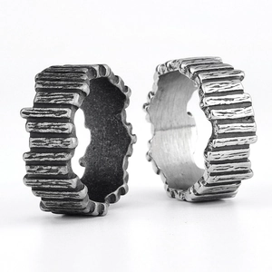 Viking style stainless steel rings with tree bark texture in silver and black finish