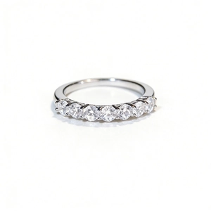 Elegant S925 sterling silver band ring featuring seven round-cut cubic zirconia stones