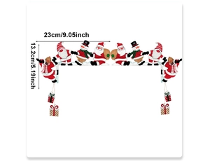 Detailed view of Christmas door frame corner decor with Santa and reindeer motifs