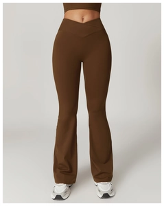 Detailed view of dark brown high waist flare yoga pants with V-shaped crossover waistband