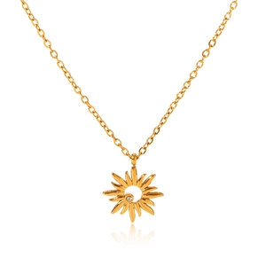 Macro view of gold stainless steel sun pendant with center diamond inlay and fine chain