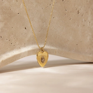 Collier avec pendentif cœur plaqué or 18K et zircon ovale sur une chaîne à boules élégante