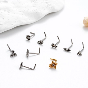 L-shaped stainless steel nose studs with sparkling clear zircon geometric tops