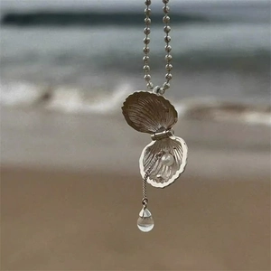 Silver shell pendant necklace with pearl inlay and water drop charm on bead chain