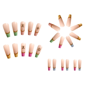 Detail of luxury press-on nails with LV monogram pattern and gold glitter French tips