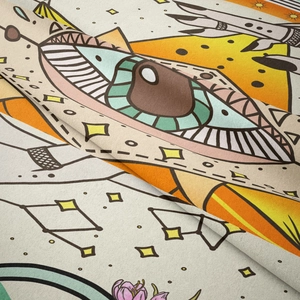 Close-up of Eye of Horus printed fabric texture with bohemian mystical motifs