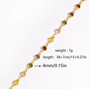 Detail shot of a gold necklace with multi-color zircons showing size and weight specs