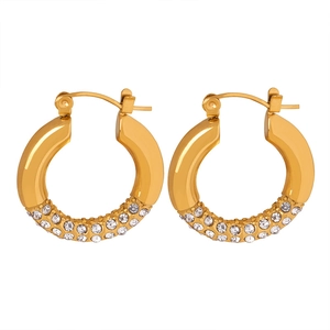 Elegant 18K gold-plated geometric hoop earrings with shimmering CZ pavé stones on white background