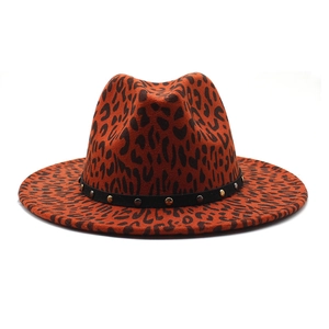 Detailed close-up of leopard print wool jazz hat featuring black band with metal rivets
