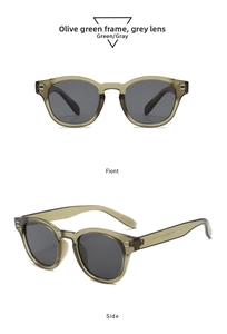 Detail view of olive green acetate frame with silver metal accents and gray lenses