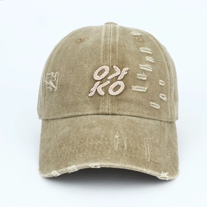 Vintage khaki washed cotton baseball cap with OKO pink embroidery and distressed details