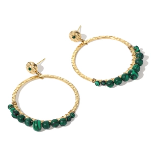 Hammered 18k gold earrings featuring round green natural stone beads on a white background