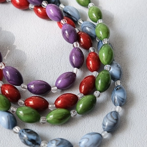 Macro shot of colorful acrylic marble beads for DIY jewelry and bag strap accessories