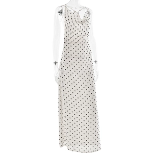 Detailed view of polka dot maxi dress with halter neckline and sleeveless design