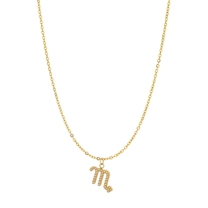 Macro detail of gold Scorpio zodiac pendant with micro-pave cubic zirconia crystals