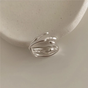 Minimalist 925 sterling silver ring with organic liquid metal texture and polished finish